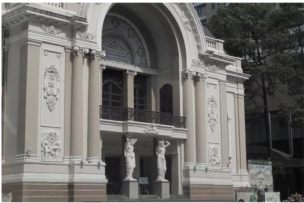 The Saigon Opera House façade reflects Petit Palais-inspired decor, featuring Renaissance-style reliefs of semi-nude Goddesses of Art at the entrance
